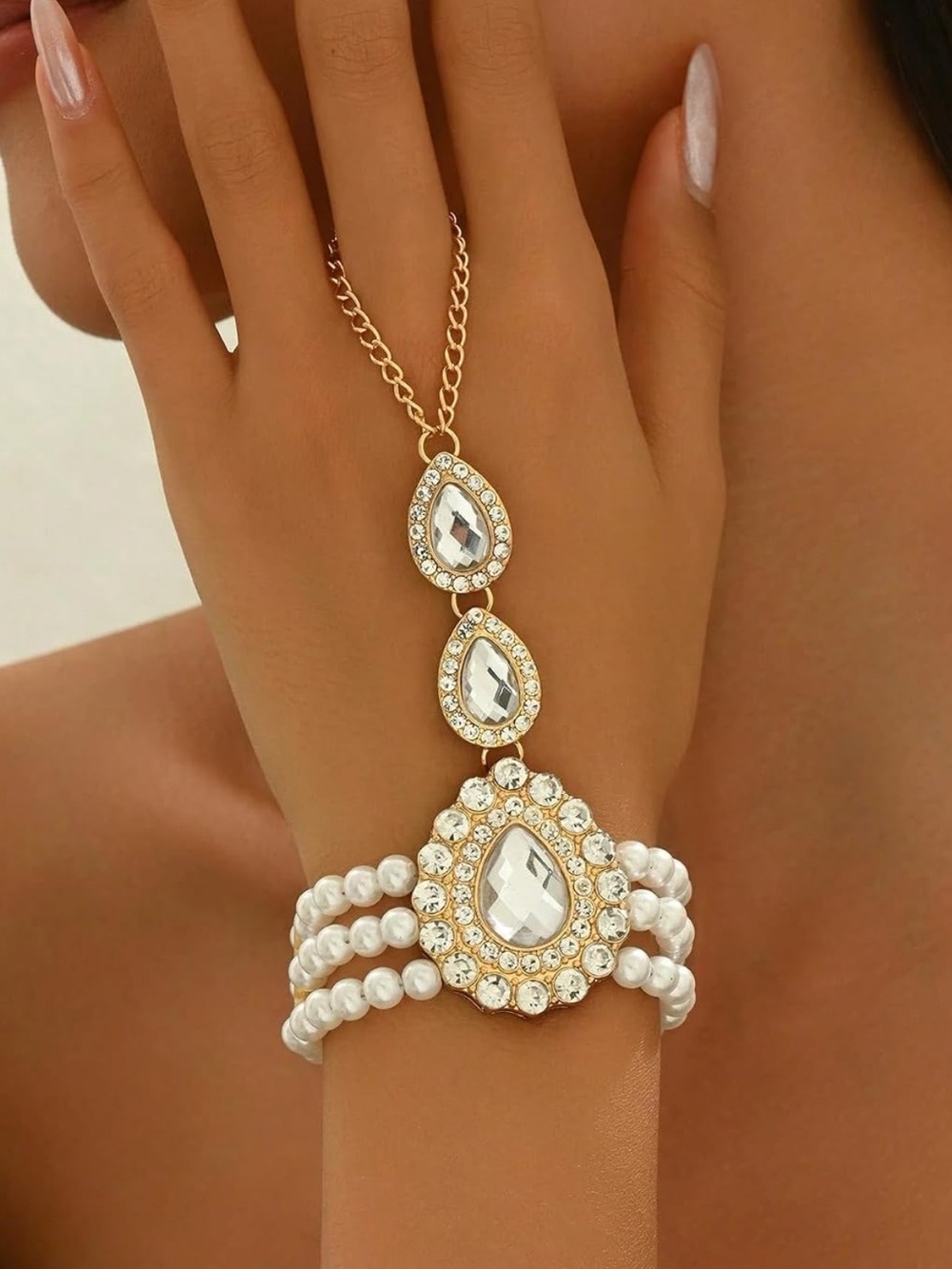 Anthropologie Gold Pearl and Crystal Teardrop Hand Bracelet